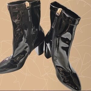 Black patent leather ankle boots